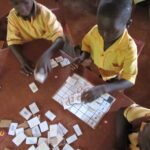 KG2 children at Brenu enjoy a weather related counting game
