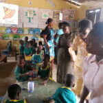 The teachers observe some of the table top activities in the classroom