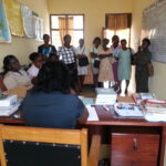 The teachers observe some of the table top activities in the classroom