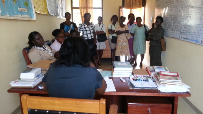 The teachers observe some of the table top activities in the classroom