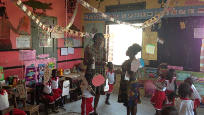 one of the trainers coaching a teacher during ICC
