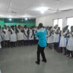 image: Lord Acquah energising workshop particpants
