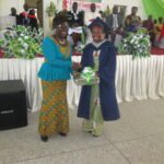 Regina Assan being awarded the best ECE student
