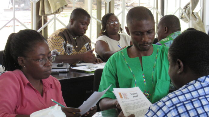 The OLA trainers practice some scenarios they may face in the screening process