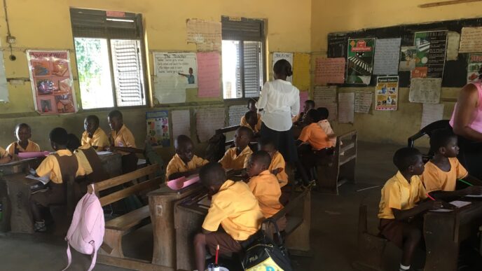 image: primary children in class at pedu