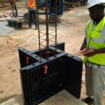 Lawrence Mensah demonstrating plastic formwork