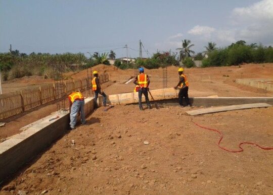 two men working on form work