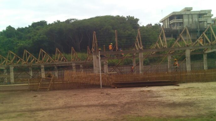 volunteer thomas being lifted by site team