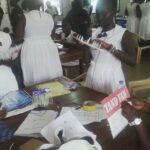 image: student teachers making resources ghana