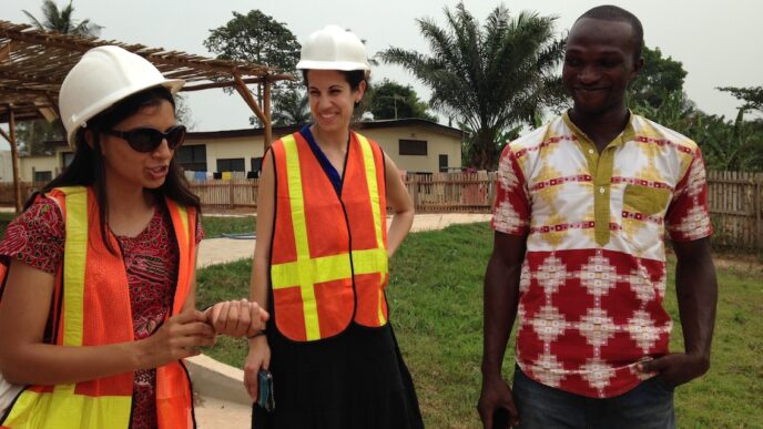 image: Dr Sharon chatting with a child