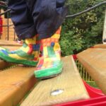 image: welly on climbing frame