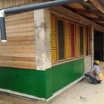 painting outside of school green
