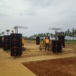 Lawrence Mensah demonstrating plastic formwork