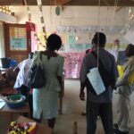 The new head teachers admiring the KG2 classroom at Dominase