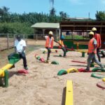 image: site team enjoying playground at akwidaa