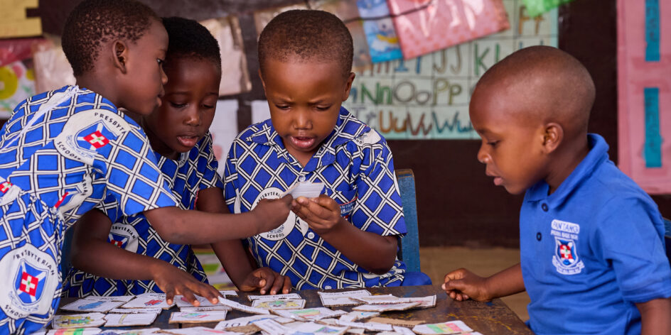 children partaking in table top activitites